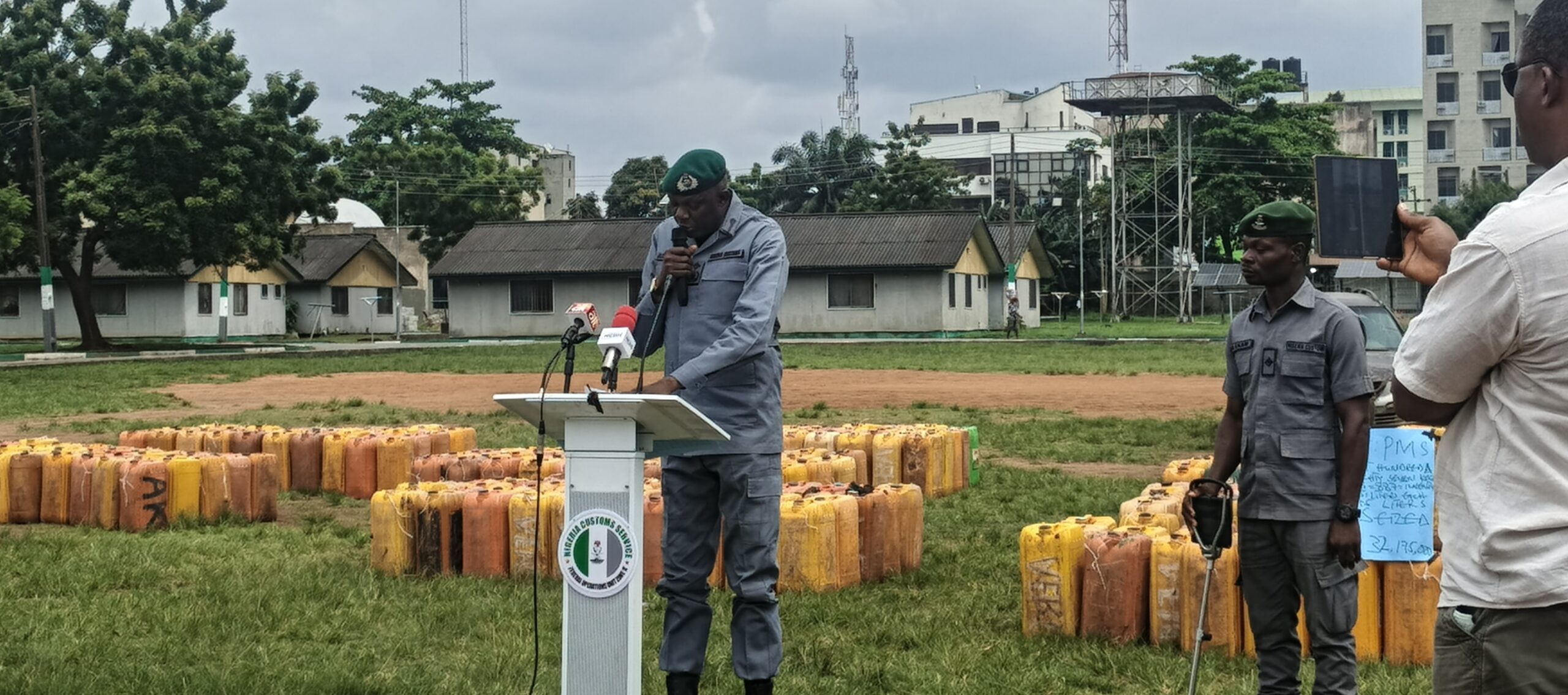 National Coordinator Operation Whirlwind, Abubakar Aliyu addressing journalists and other participants at the Public Auction of seized PMS